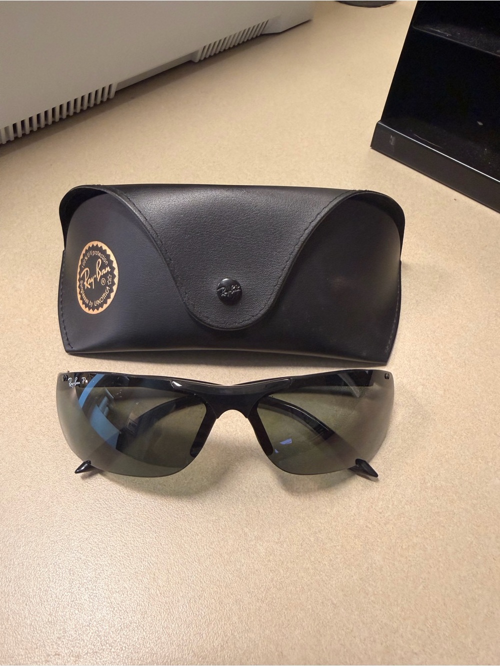 Ray-Ban polarized Women's Black Wrap Sunglasses